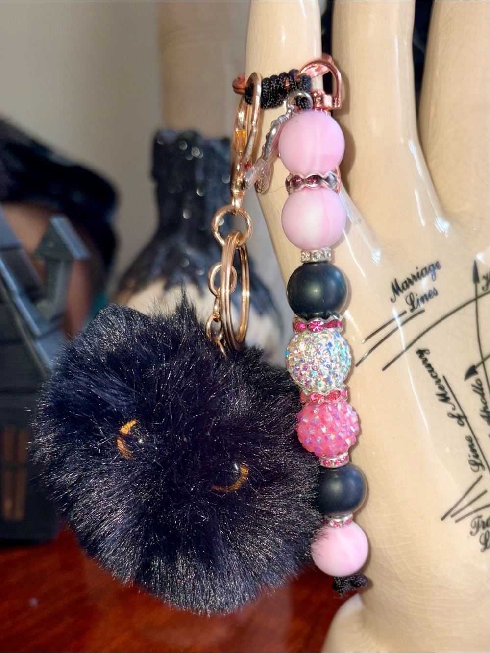 Breast cancer bag charm with black cat Pom